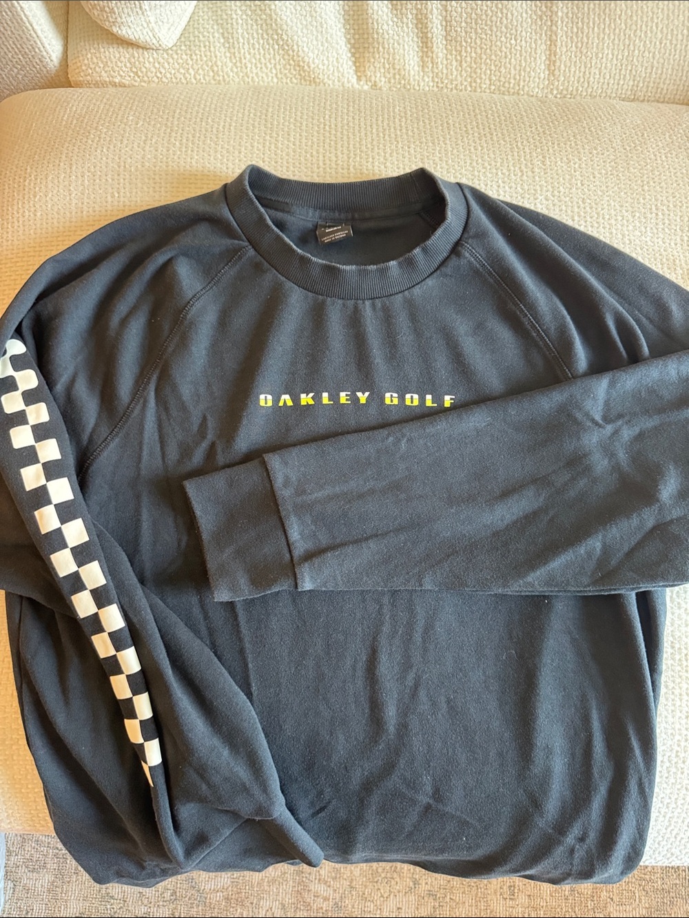 Oakley Black Crewneck with White Checkered Sleeve and Yellow Logo